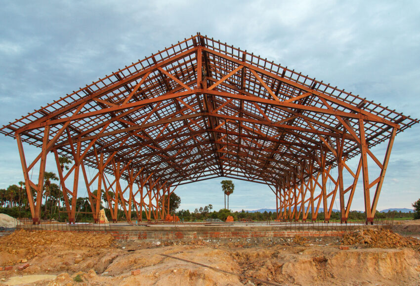 Timber framework of the school building during construction.