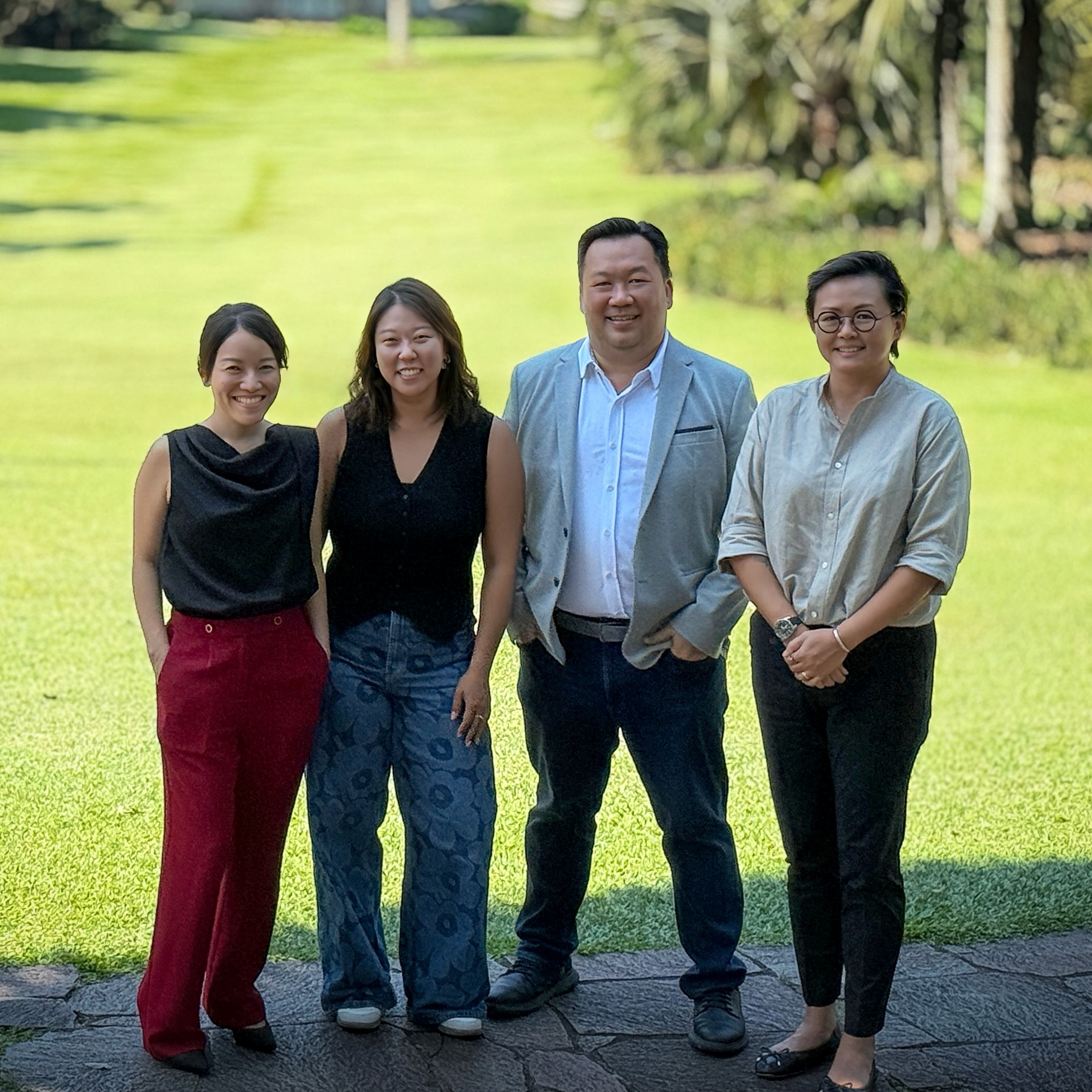 The Smiling Gecko Singapore team.